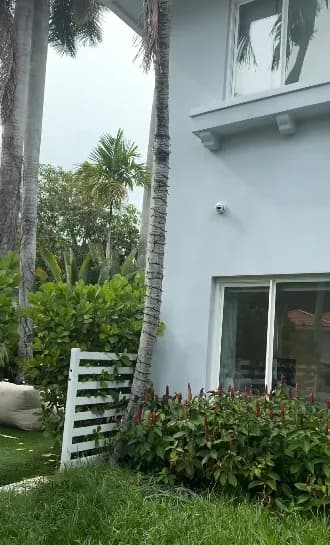 Camera at the corner of a home exterior