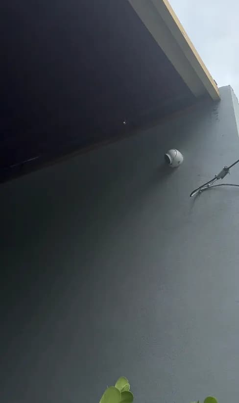 Camera installed under a roof eave