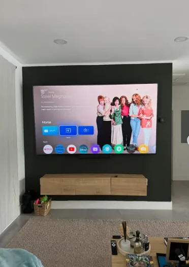 Living room with a wall-mounted TV
