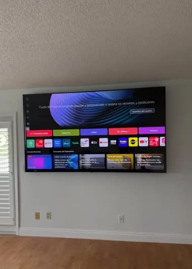 Wall-mounted TV in a bright room